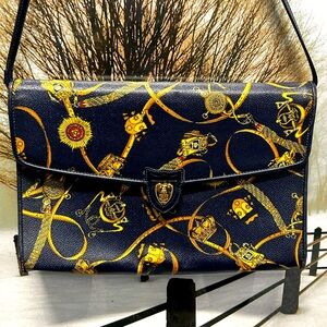 Mark Cross Bucket Bag. Leather. Black & Gold. America's First Luxury Brand.